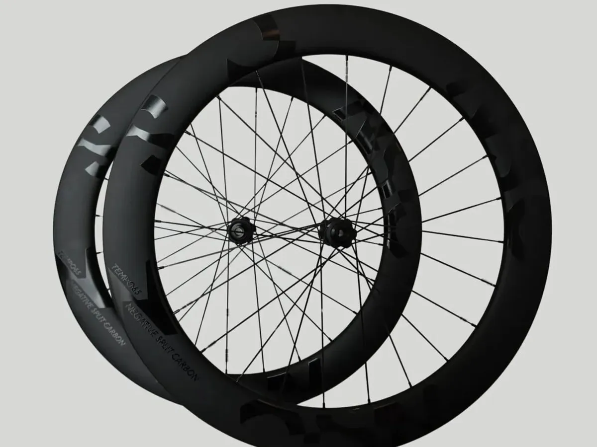 A pair of Negative Split Carbon wheels with tonal black graphics