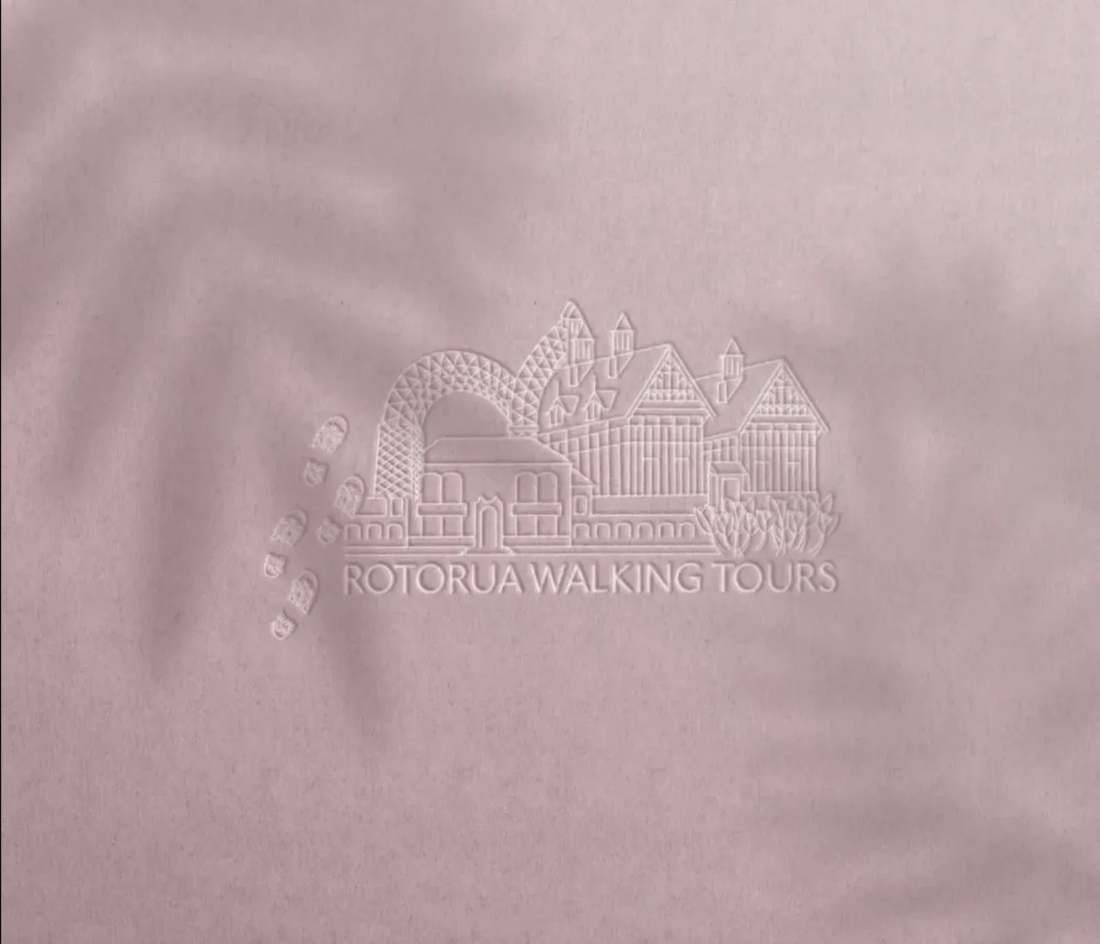 Rotorua Walking Tours logo blind-embossed on paper